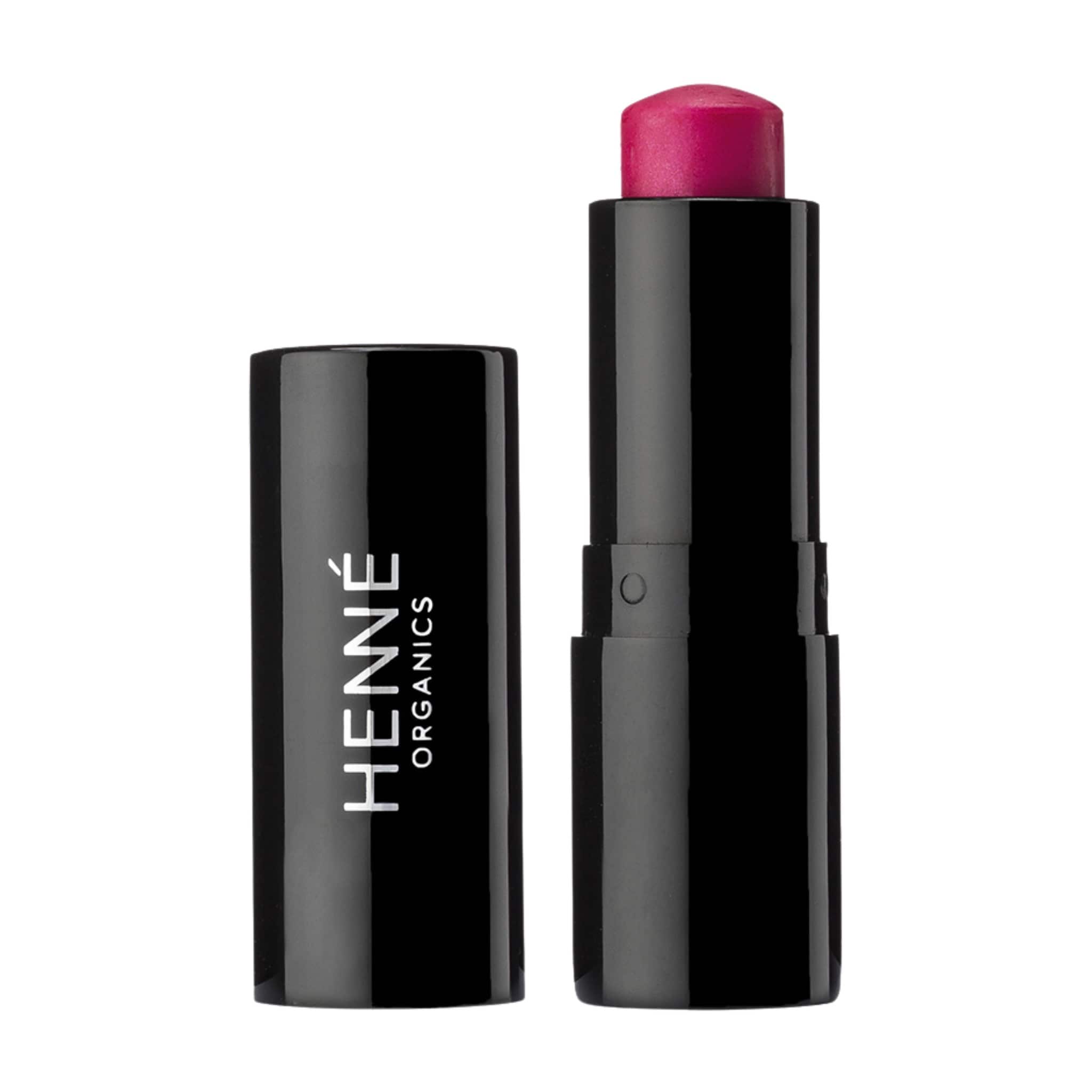 Henné Organics Luxury Lip Tint in Azalea uncapped beside its black cap showing the vibrant fuchsia pink balm 1