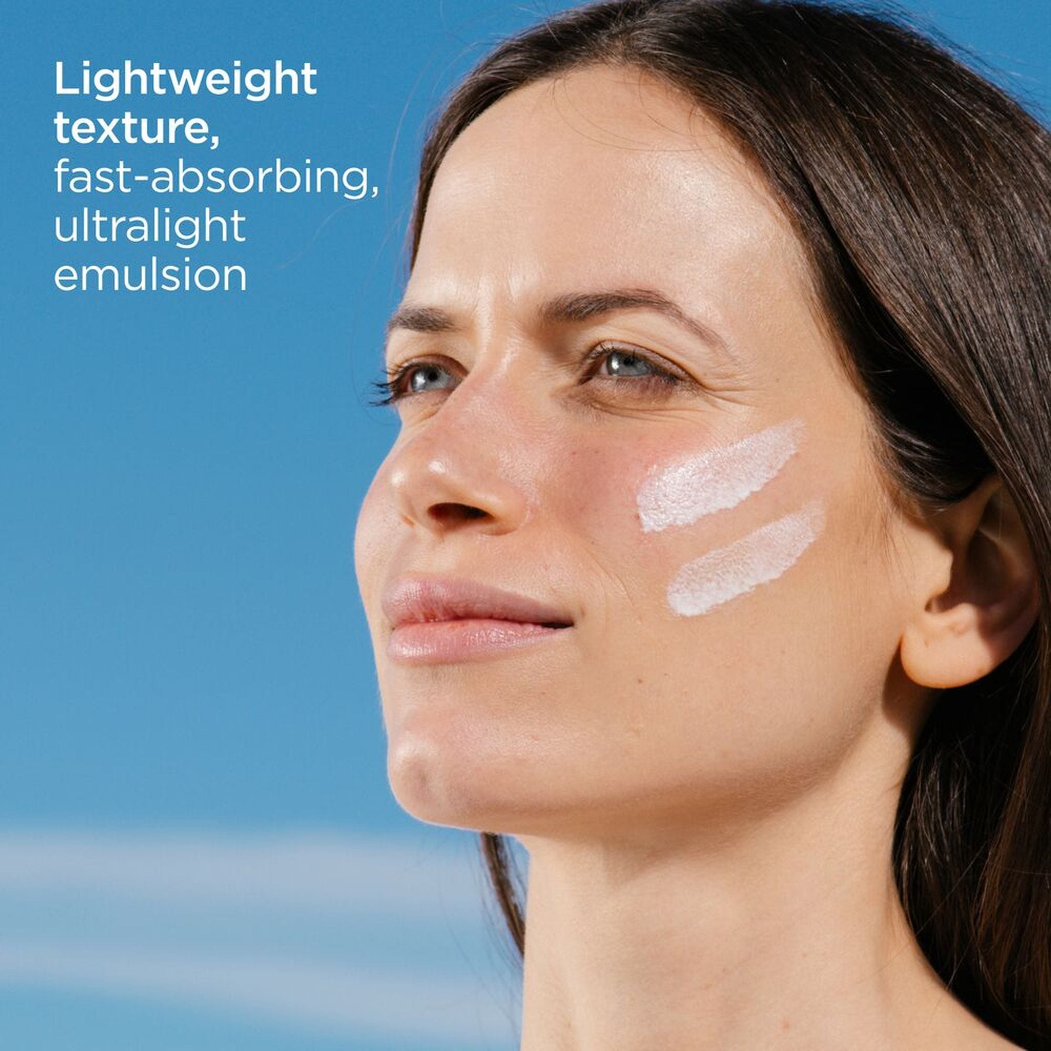 ISDIN Eryfotona Actinica SPF 50+ ultralight emulsion texture swatched on face, fast-absorbing mineral sunscreen 6