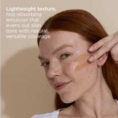 Lightweight fast-absorbing tinted sunscreen emulsion applied to skin