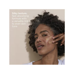 Silky fast-absorbing tinted sunscreen applied to skin