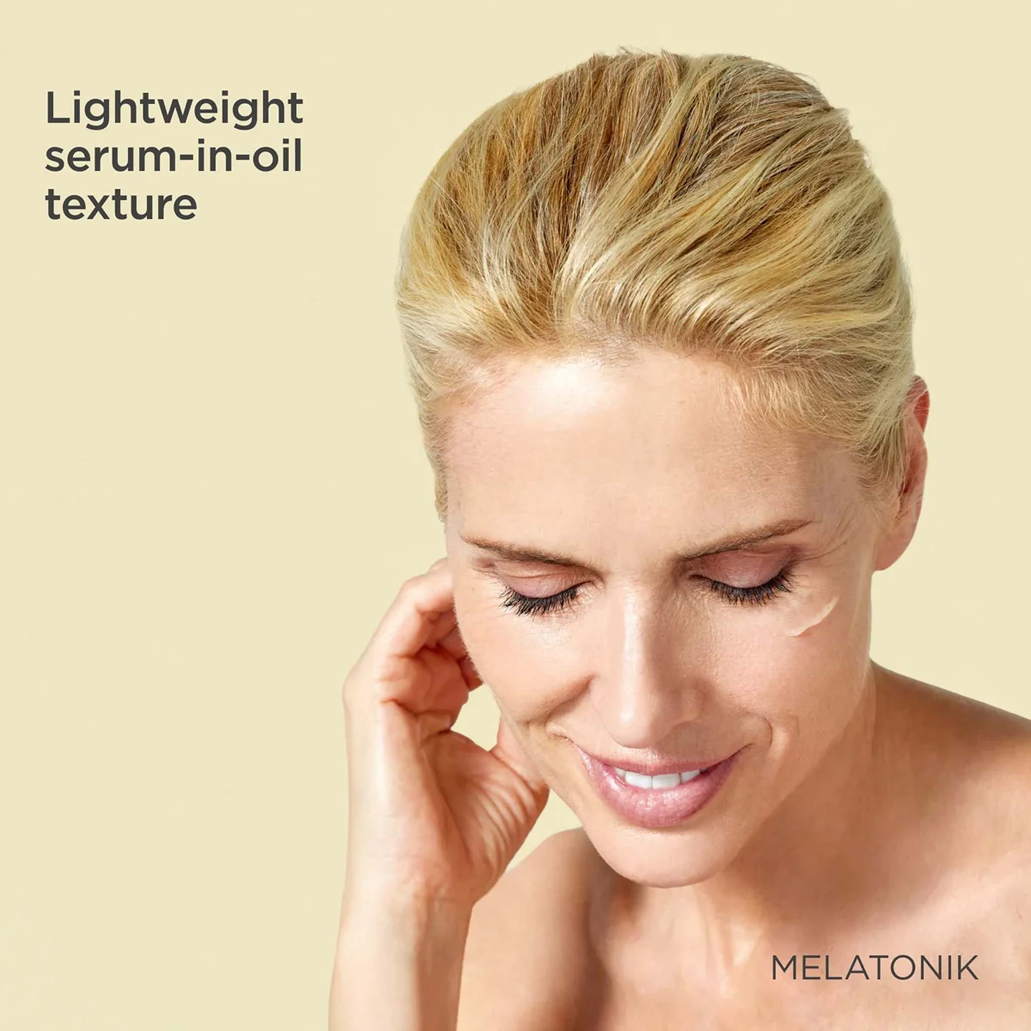 Woman with eyes closed wearing ISDIN Melatonik lightweight serum-in-oil night serum on her cheek