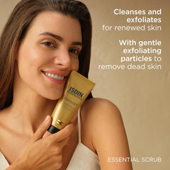 Woman holding a tube of ISDIN scrub with text about its benefits on a beige background