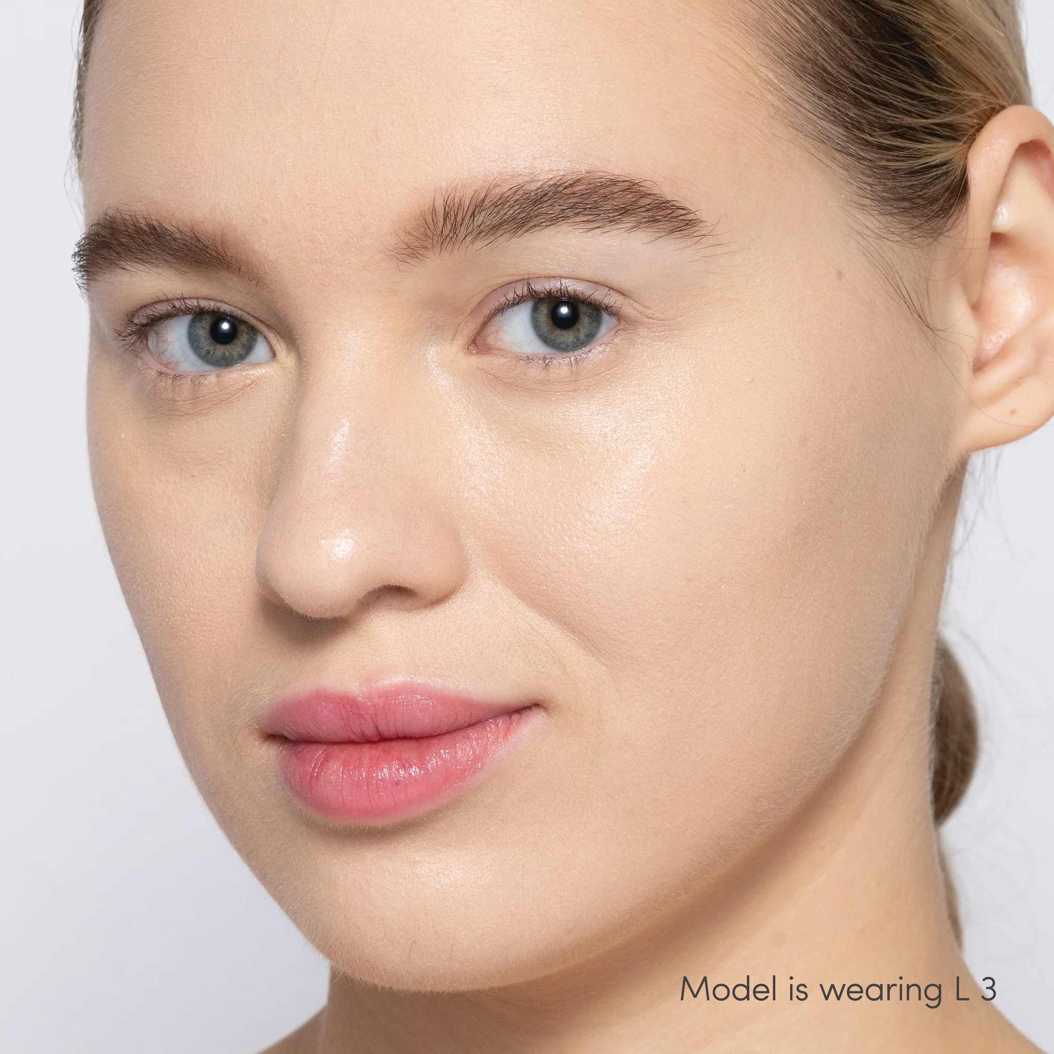 Jane Iredale Skintuition Liquid Concealer L3 - light with neutral undertones worn on model with glowing skin 3