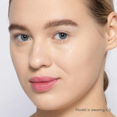 Jane Iredale Skintuition Liquid Concealer L3 - light with neutral undertones worn on model with glowing skin 3