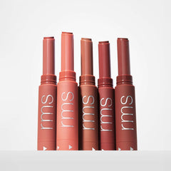 Five Legendary Serum Lipstick nude shades standing upright showing bullet color 8