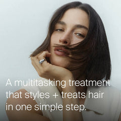Woman with a sleek dark bob showing Perfect Hair Day 5-in-1 Styling Treatment styles and treats hair in one step
