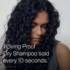 Woman with voluminous dark curly hair highlighting Living Proof Dry Shampoo as one sold every 10 seconds