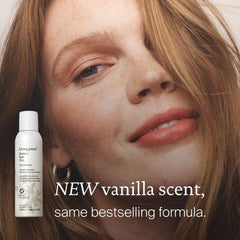 Woman with auburn hair beside Perfect hair Day Dry Shampoo in new warm vanilla scent with the same bestselling formula