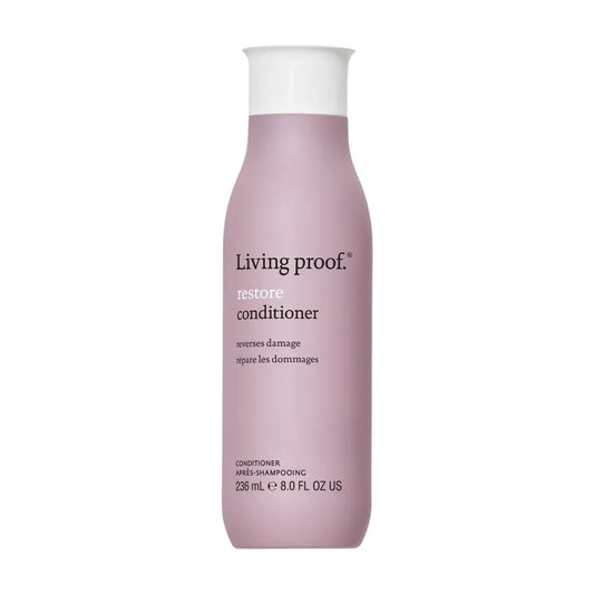Living Proof Restore Conditioner 8 oz in rounded bottle that reverses damage for stronger smoother hair on white