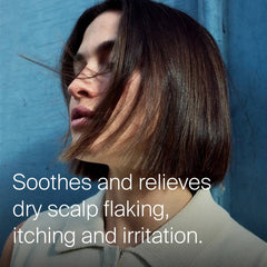 Woman with a sleek brown bob showing Dry Scalp Treatment soothes and relieves dry scalp flaking itching and irritation