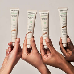 MDSolarSciences MD Mineral BB Creme SPF 50 all four shades Light Medium Dark Deep held by diverse hands 7