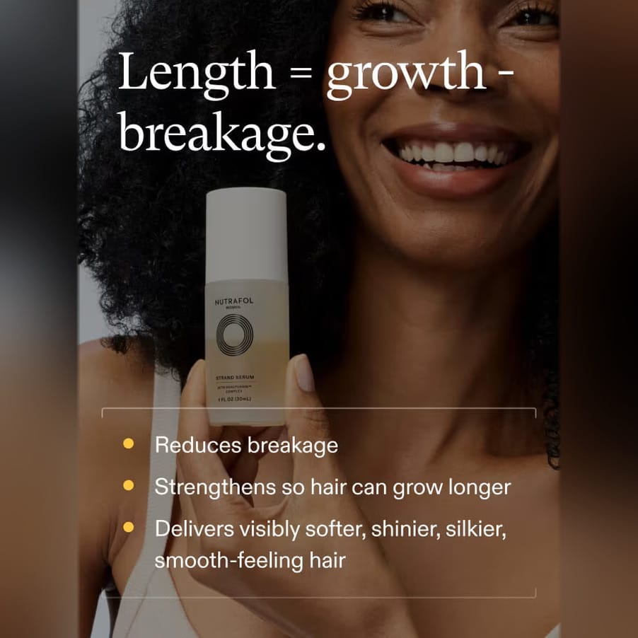 Smiling woman with curly hair holds Nutrafol Strand Serum that reduces breakage so hair can grow longer