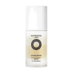 Nutrafol Women Strand Serum 1 fl oz frosted bottle with white cap on a white background