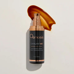 Catalyst MD vitamin C serum bottle with amber serum texture swatch on cream background