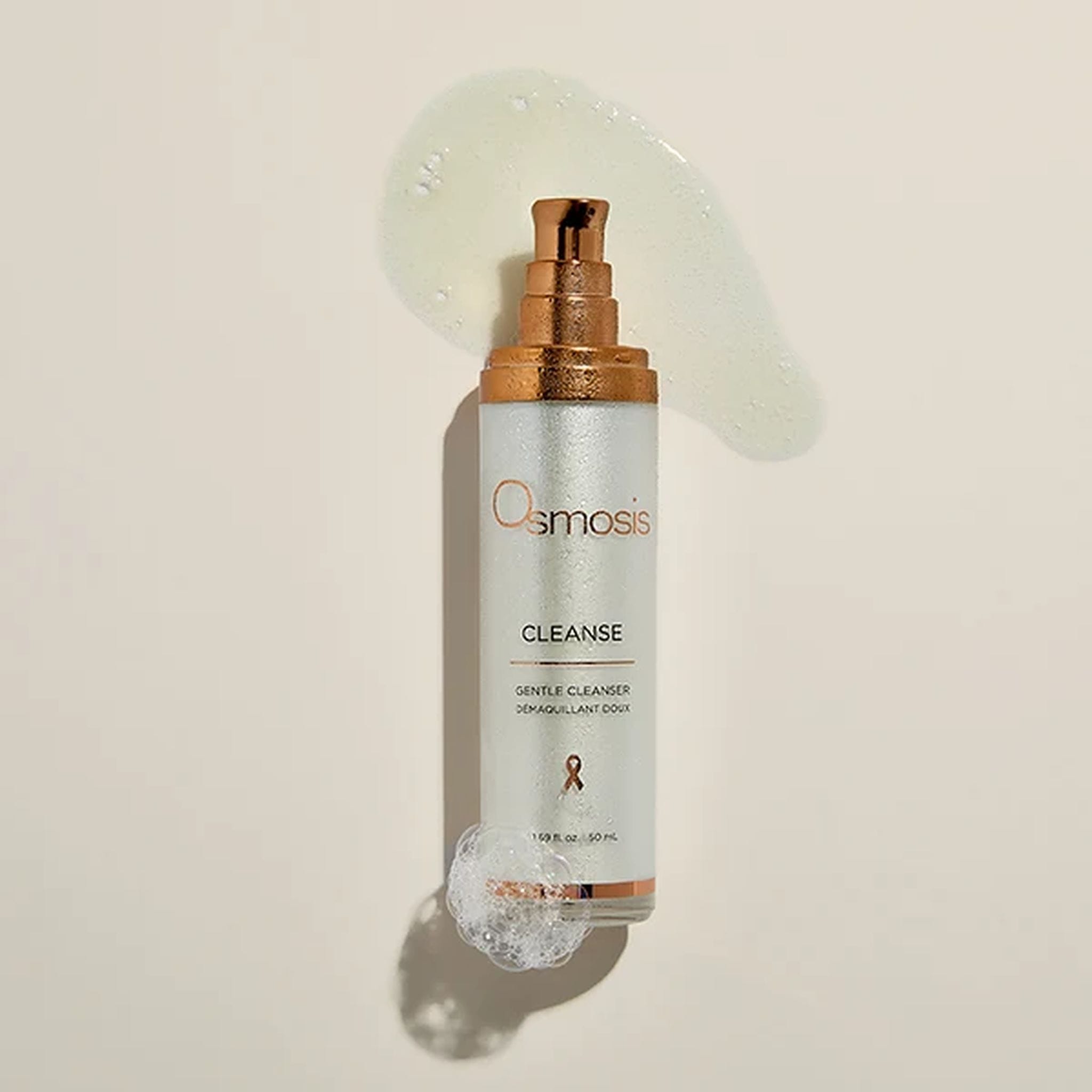Osmosis Cleanse Gentle Cleanser bottle with clear gel texture and foamy lather