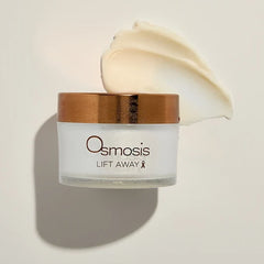 Osmosis Lift Away Cleansing Balm jar with a swatch of rich creamy balm texture