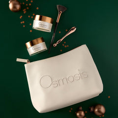Osmosis Sugar and Spice Mask Set styled on a green background with gold ornaments and confetti