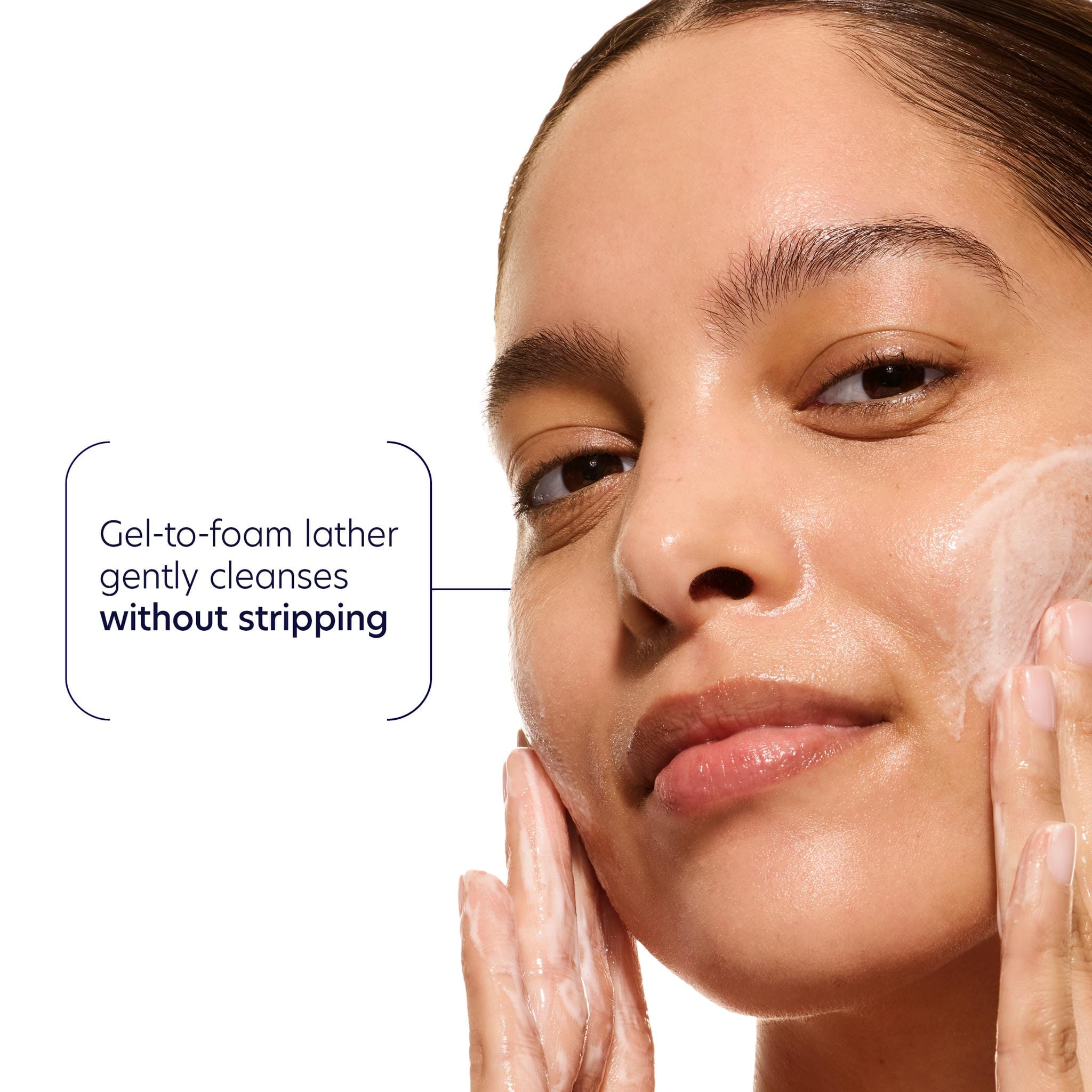 Close-up of gel-to-foam lather gently cleansing skin without stripping natural moisture