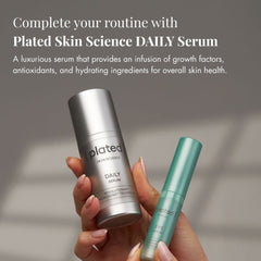 Woman holding Plated Daily Serum and Eye Serum bottles together