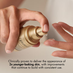 Plated Intense Serum dispensed onto fingertip showing lightweight texture