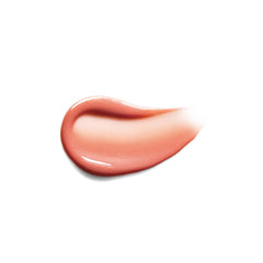 Crystal Slipper lip oil swatch showing sheer shimmering peach finish 2