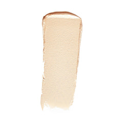RMS Beauty Luminizer Magic swatch showing a warm champagne cream highlighter 2