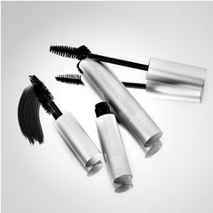 Straight Up mascara tubes and wands shown in black and white styling