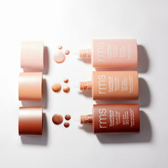 RMS Beauty SuperNatural Radiance Serum three shades with caps and drops flat lay 9