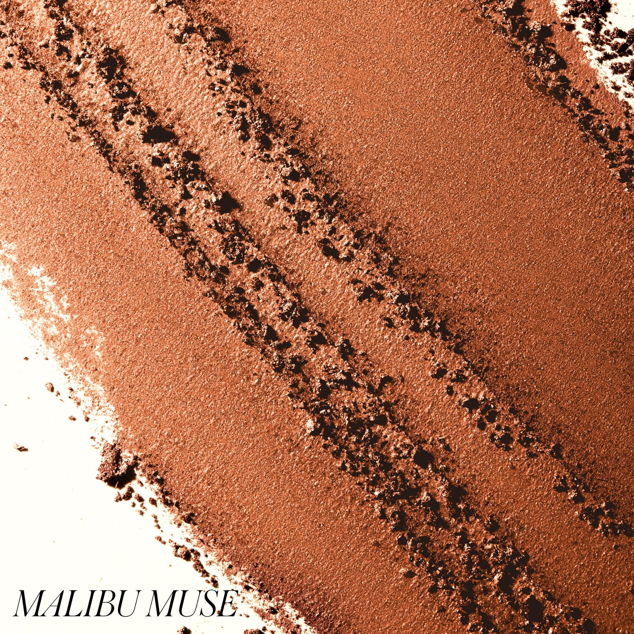Macro texture of ReDimension Hydra Bronzer powder in shade Malibu Muse 2