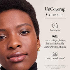 Model with Un Cover-Up Concealer claims 12 hour wear and non-comedogenic formula 6
