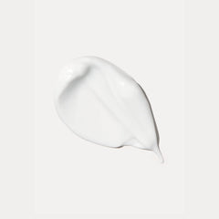 Senté Illuminé Eye Cream smooth rich cream texture closeup showing lightweight hydrating formula