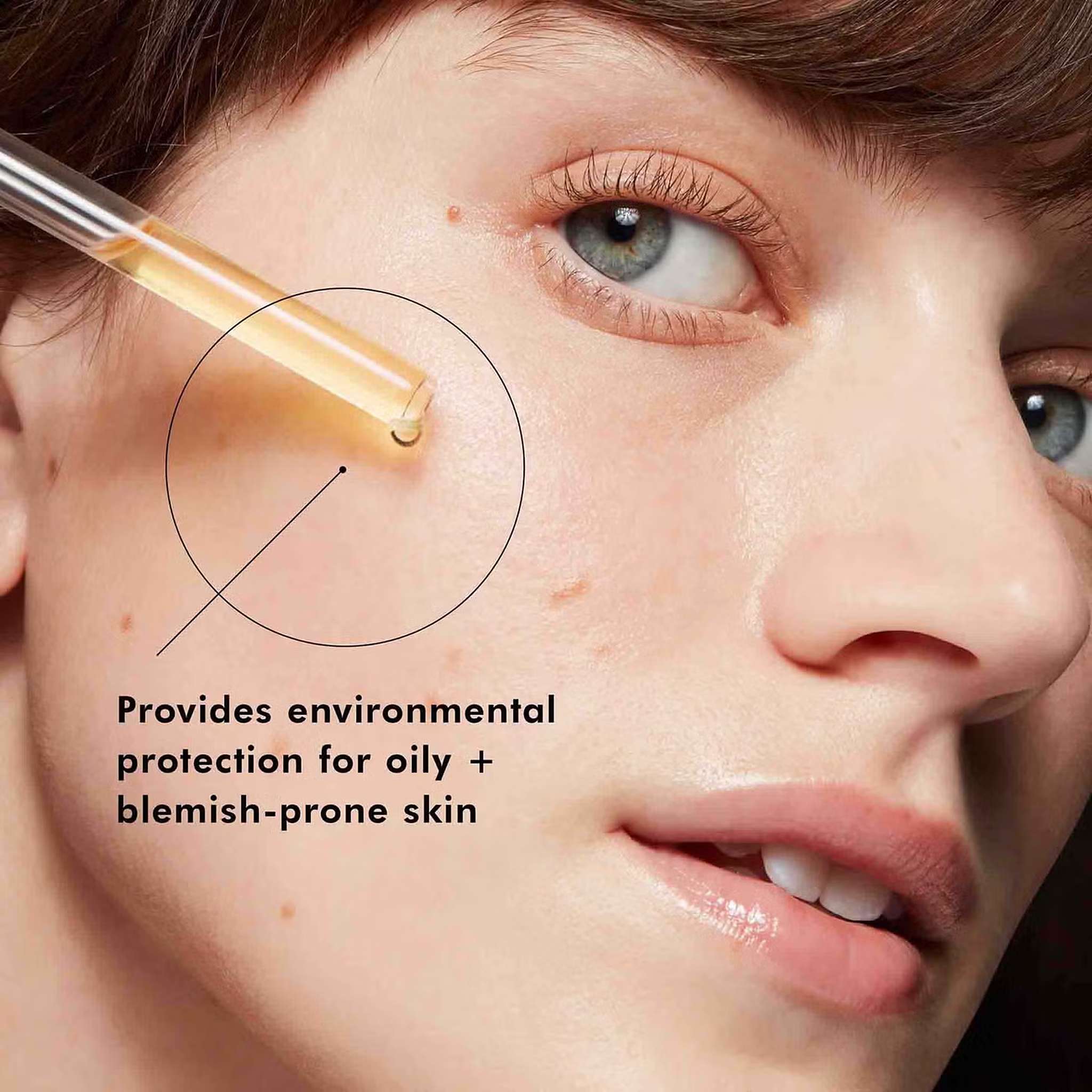 Applying SkinCeuticals Silymarin CF vitamin C serum with dropper for environmental protection on oily blemish-prone skin