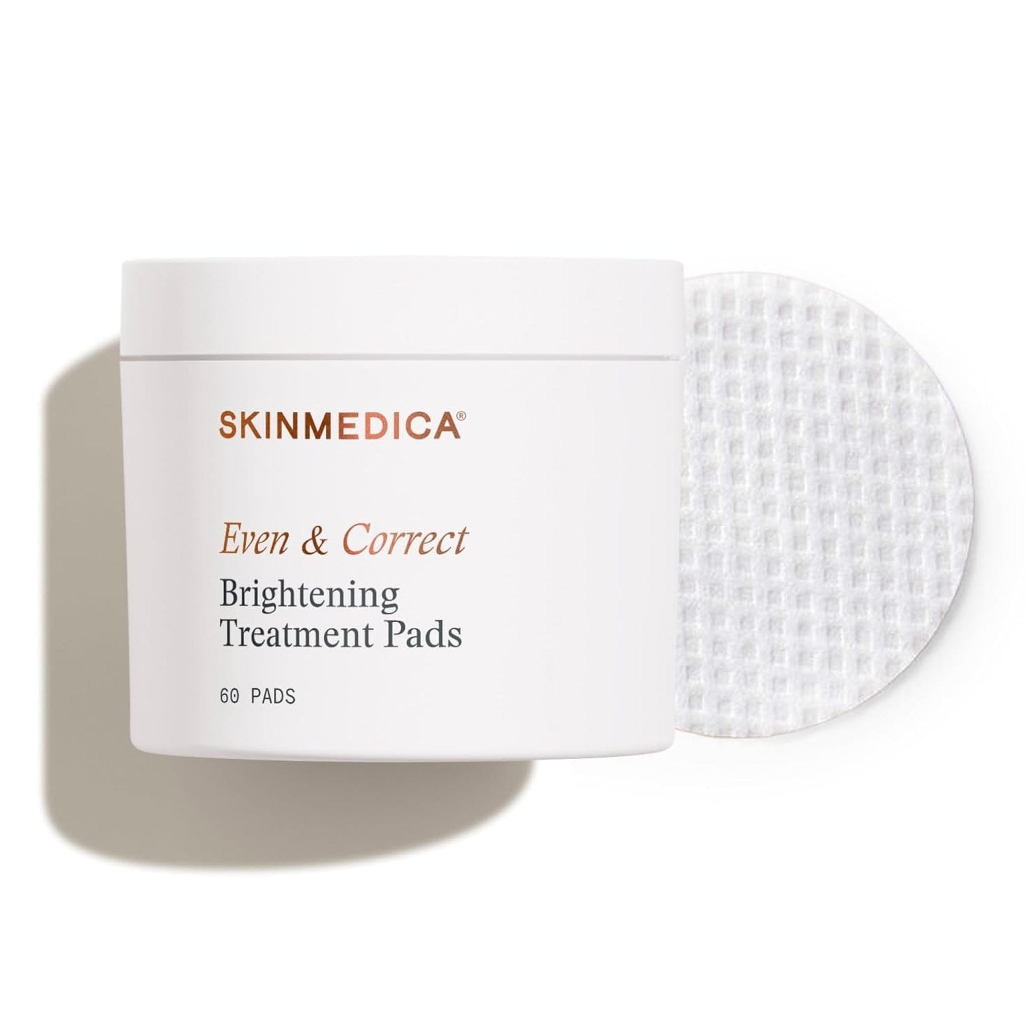 SkinMedica Even & Correct Brightening Treatment Pads white jar with single exfoliating pad displayed beside it, 60 pads
