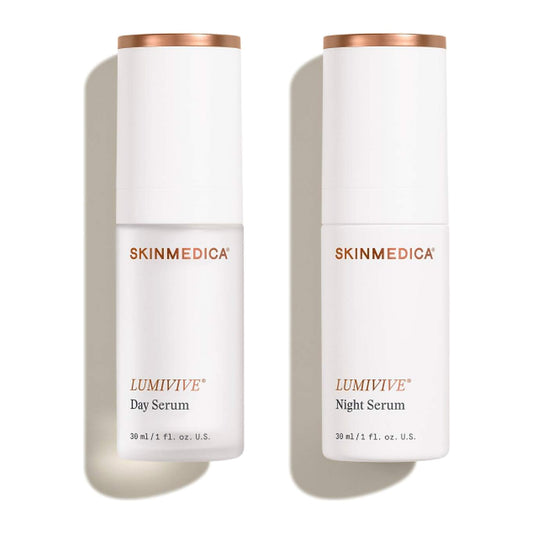 SkinMedica Lumivive Day Serum and Night Serum 1 oz bottles with rose gold caps