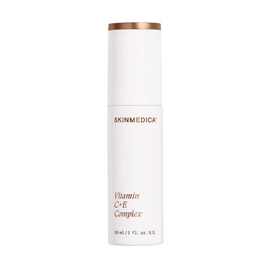 SkinMedica Vitamin C+E Complex old silver bottle next to new white and rose gold packaging