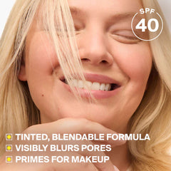 Tinted SPF 40 formula blurs pores and primes skin for makeup