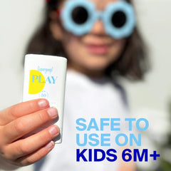 Child holding Supergoop PLAY Mineral Stick SPF 50 safe for kids six months and up
