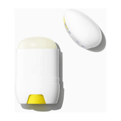 Sunscreen stick open with cap showing balm texture
