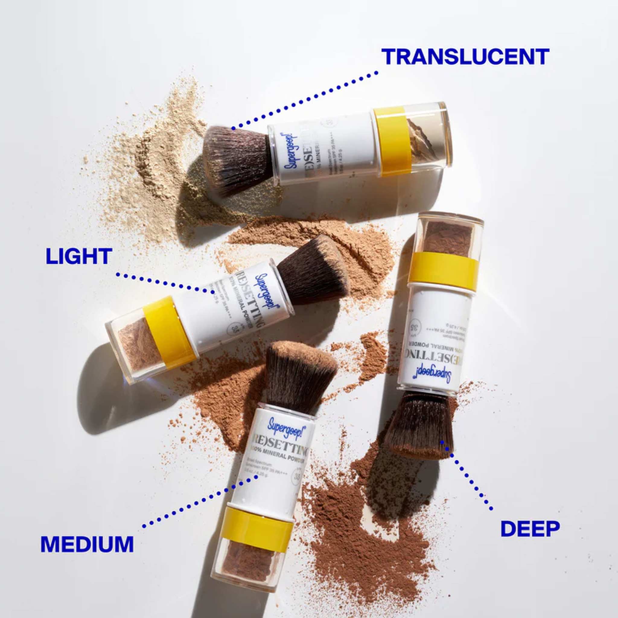 Supergoop Resetting Mineral Powder shades translucent light medium and deep with brush applicators