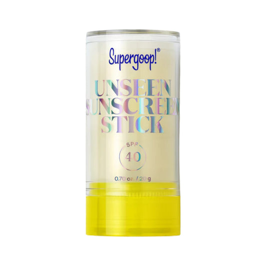 Supergoop Unseen Sunscreen Stick SPF 40 clear tube with yellow sunscreen balm