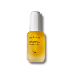 Symbiome Rewind003 Postbiomic Oil golden bottle with pump