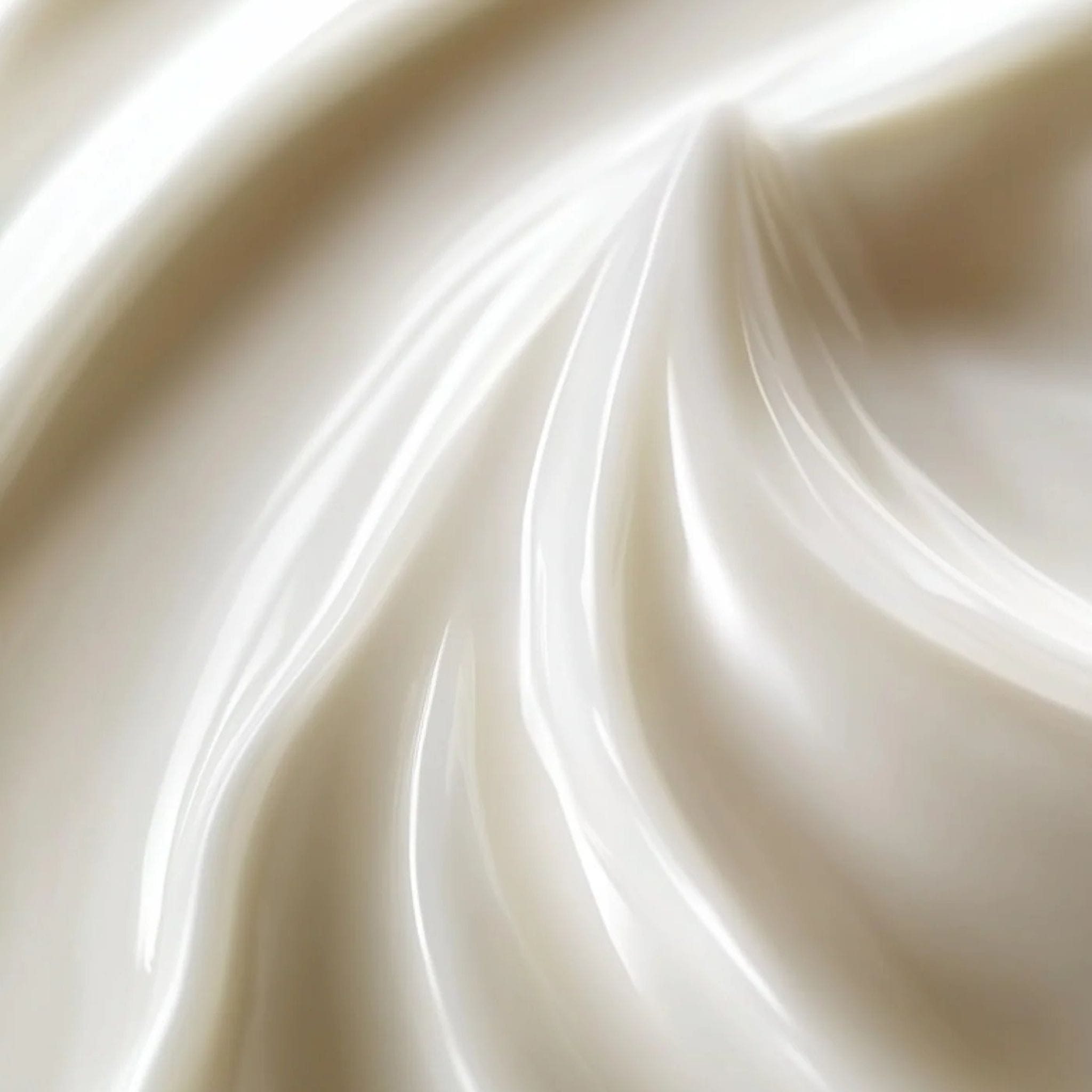 Close-up swirl of Symbiome The One Restorative Cream showing rich silky texture and luminous finish