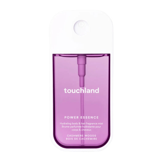 Touchland Power Essence Cashmere Woods hydrating body and hair fragrance mist in a purple and white pocket spray