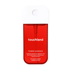 Touchland Power Essence Golden Amber hydrating body and hair fragrance mist in a red and white pocket spray