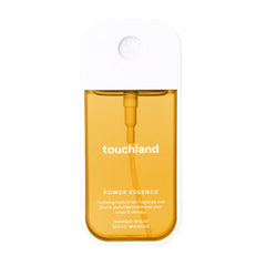 Touchland Power Essence Mango Mojo hydrating body and hair fragrance mist in a golden yellow pocket spray