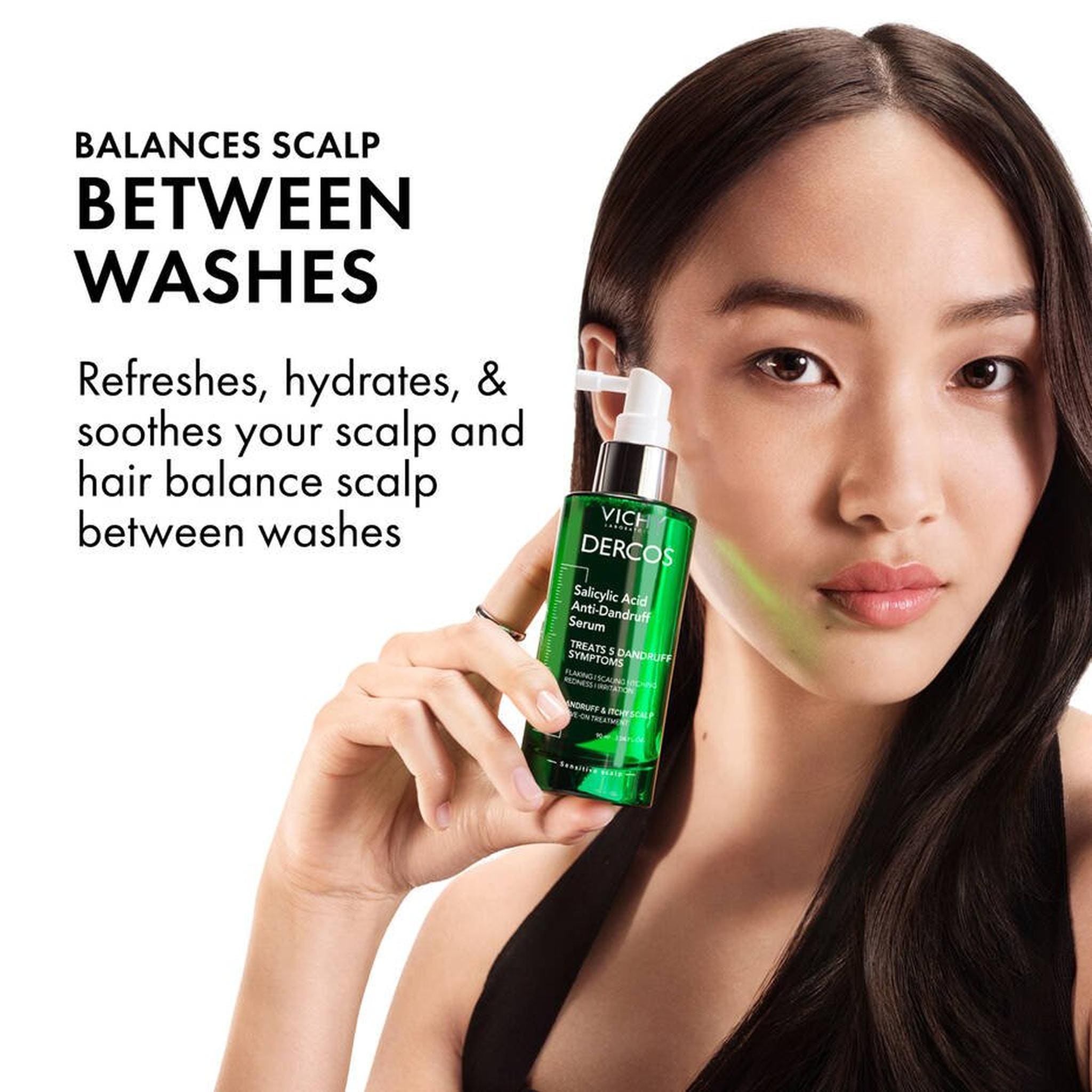 Woman applying Vichy Dercos anti-dandruff serum to balance scalp between washes