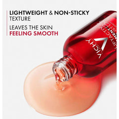 Vichy LiftActiv Pigment Specialist B3 serum pouring from red bottle showing lightweight non-sticky texture