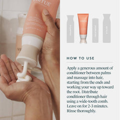 Hand dispensing Virtue Curl Conditioner into palm with directions for applying from ends to roots