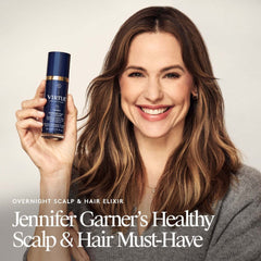 Jennifer Garner smiling and holding Virtue Overnight Scalp and Hair Elixir her healthy scalp and hair must-have