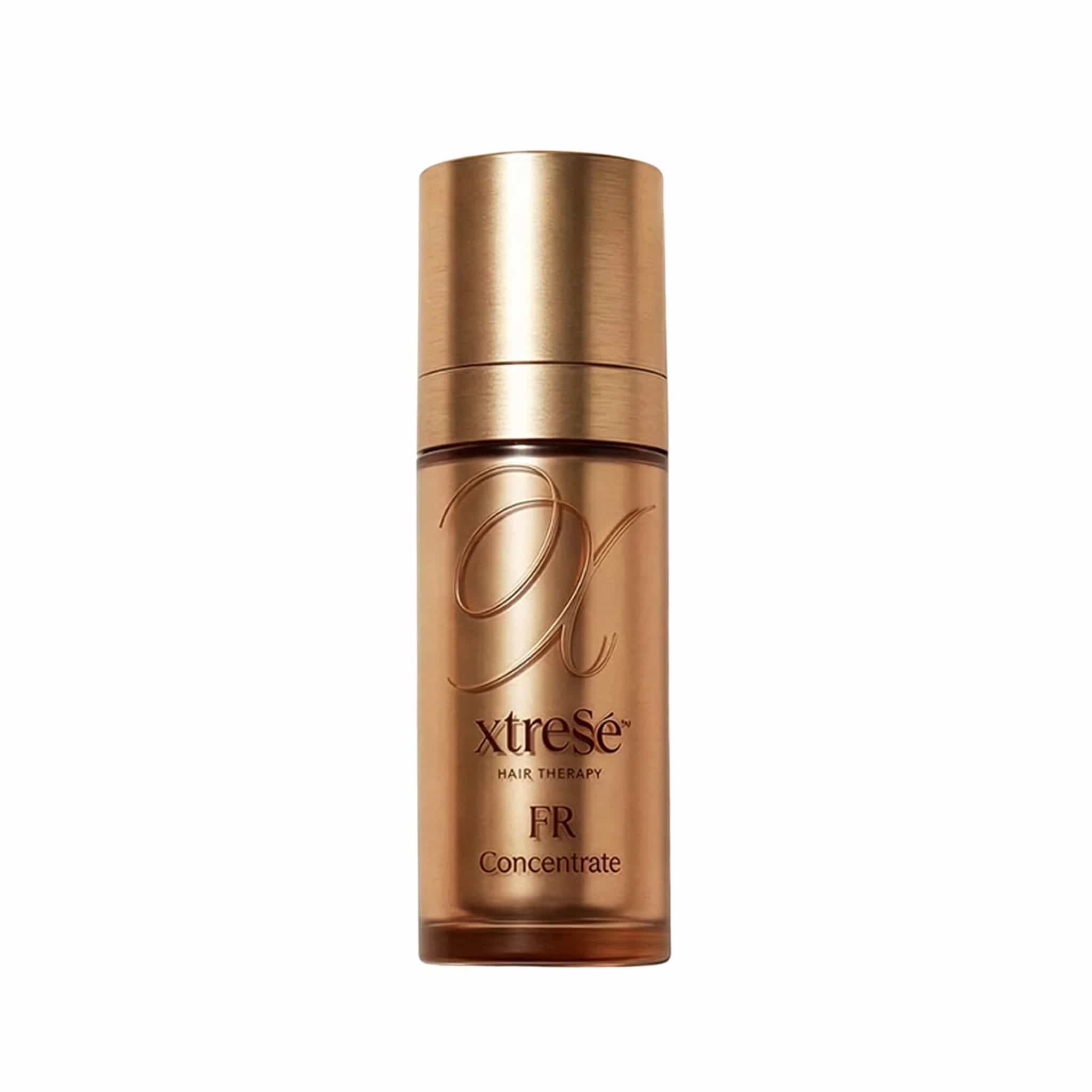 Xtresse FR Concentrate hair therapy serum bottle in gold packaging